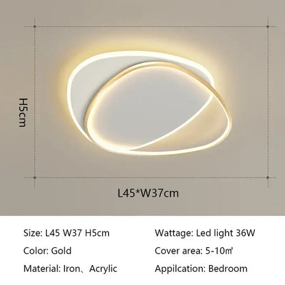 Gold-colored decorbites led ceiling light with two interlocking iron and acrylic oval rings for bedroom use