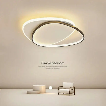 Modern decorbites led ceiling lights featuring two concentric oval rings in white glow and dark metallic frame for indoor use
