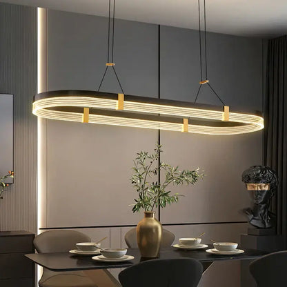 Modern oval pendant lights with glowing led strips and gold-toned metal accents decorbites led ceiling pendant