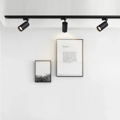 Black matte finish decorbites led ceiling spotlight with adjustable heads mounted on a ceiling rail for modern spaces