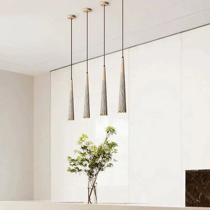 Four modern decorbites led cement cream pendant lamps with wooden tops and gray tassel shades for bedroom and bar lighting