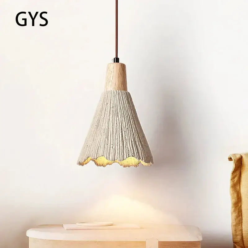 DecorBites™ LED cement pendant lamp with creamy textured concrete shade, natural wood top, and gold scalloped edge