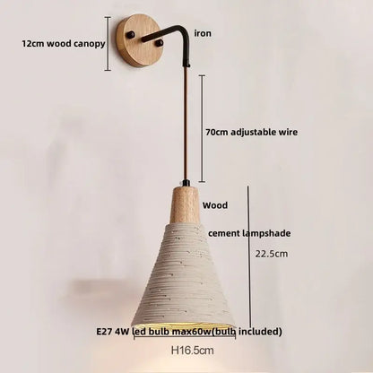 DecorBites led cement wall light with off-white textured cement shade natural wood canopy and black iron arm wall light