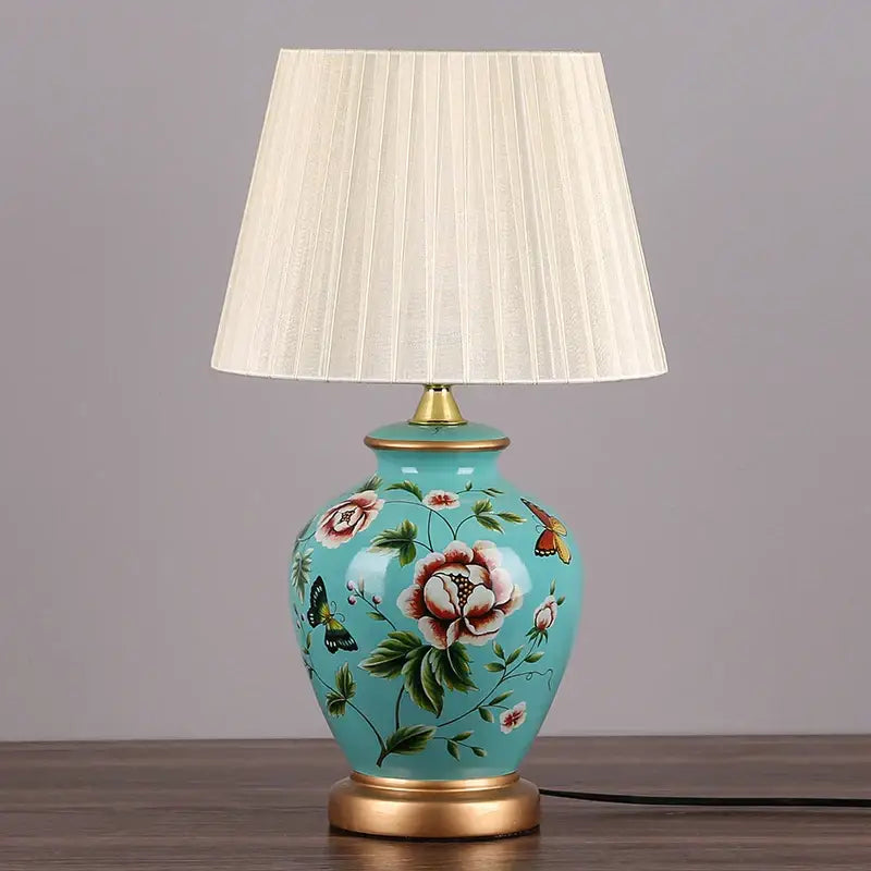 Turquoise decorbites led ceramic table lamp with hand-painted floral motifs and gold trim for living room lighting