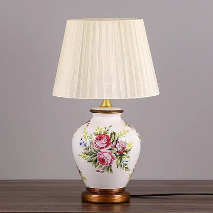 Decorbites led ceramic table lamp with white hand-painted pink rose design and off-white pleated fabric shade for living room