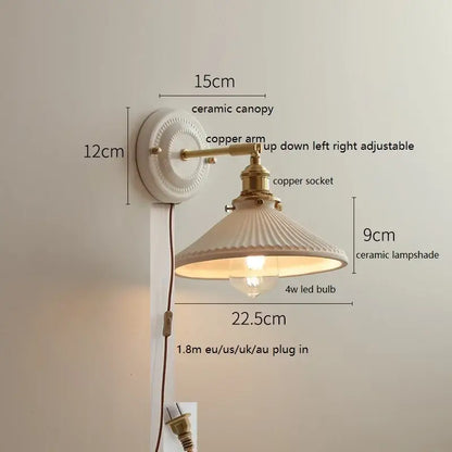 Cream-colored decorbites led ceramic wall lamp with adjustable copper arm for bedroom and bathroom mirror lighting