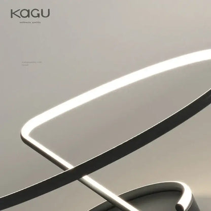A sleek decorbites led chandelier chrome lamp with minimalist curved frame and soft white illumination for home decor
