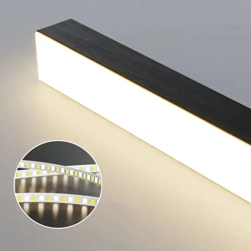 Modern rectangular led chandelier with sleek black top and warm white light for nordic minimalist kitchen islands