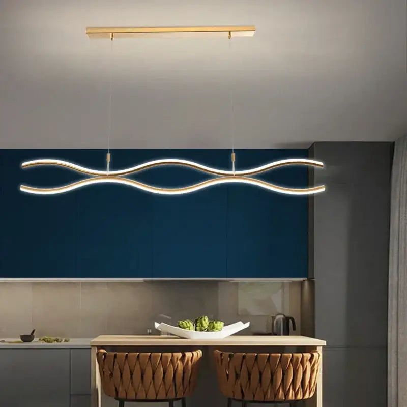 Modern gold-toned pendant light with sleek wavy design and integrated lighting decorbites led chandelier for dining