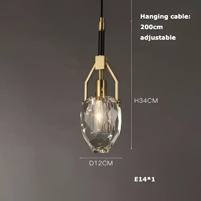 A modern decorbites led chandelier with a faceted crystal glass shade and brass-finished frame for dining room lighting