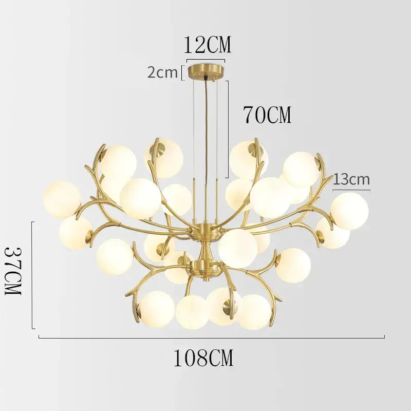 Gold-toned decorbites led chandelier with branching arms and frosted globe lights for living room and dining décor