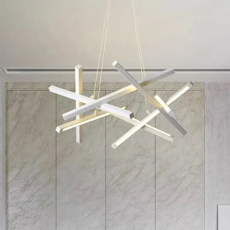 Modern white and gold geometric decorbites led chandelier with intersecting rectangular bars for indoor lighting