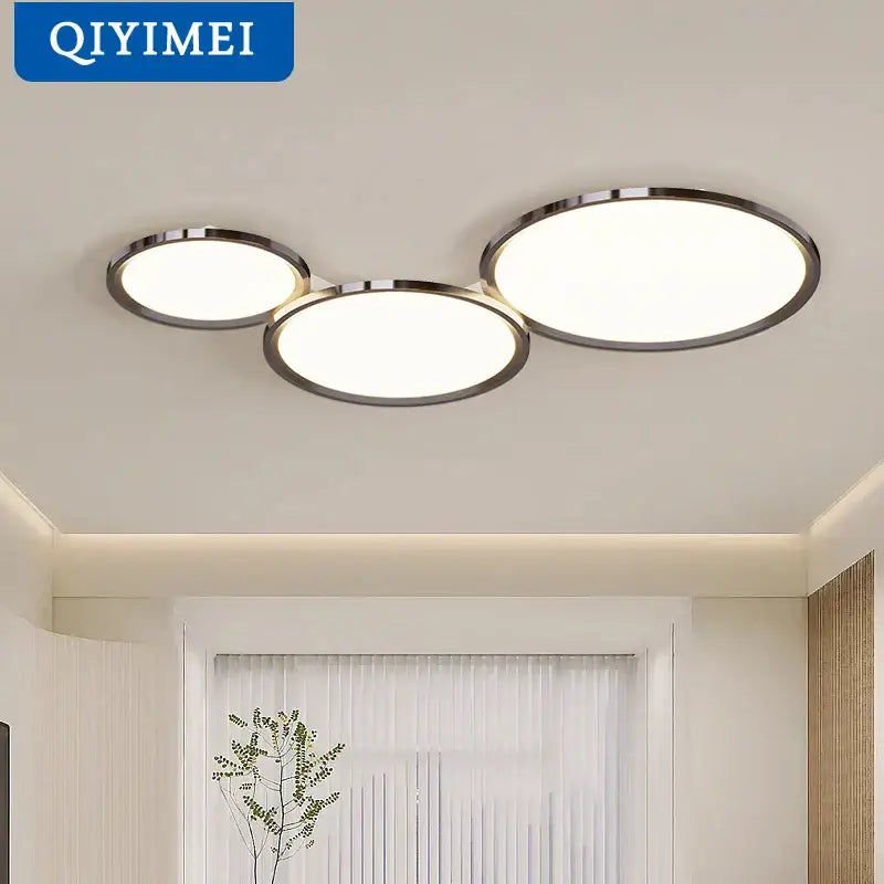 Modern three-circle decorbites led chandelier with sleek chrome frames and soft white illumination for indoor living spaces