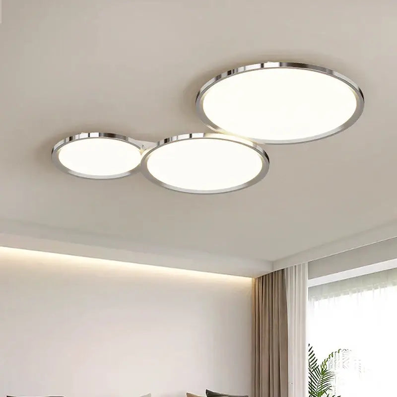 Modern three-circle led chandelier with sleek chrome frames and soft white light by DecorBites LED chandelier for indoor use