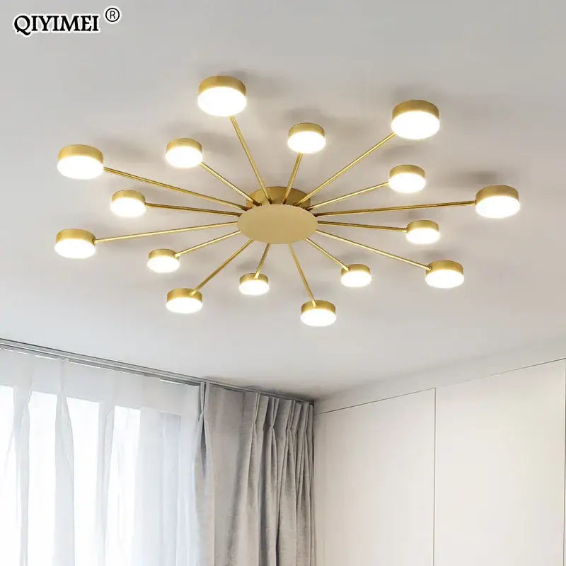 Gold-colored decorbites led chandelier with slender arms and round led bulbs for modern indoor lighting fixtures