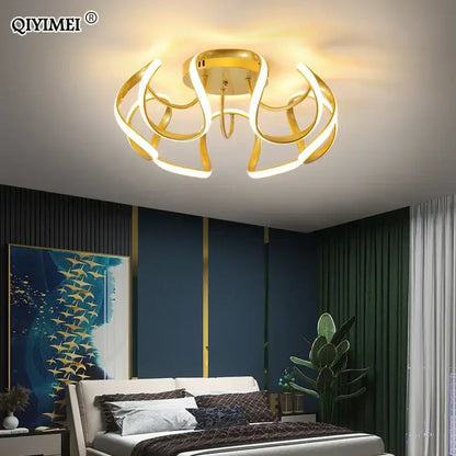 Gold-toned decorbites led chandelier with sleek curved led rings and central base for modern indoor lighting