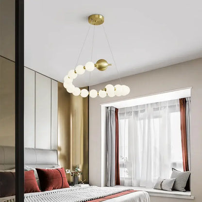 Gold-toned circular decorbites led chandelier necklace lighting with frosted glass globe bulbs for dining room use