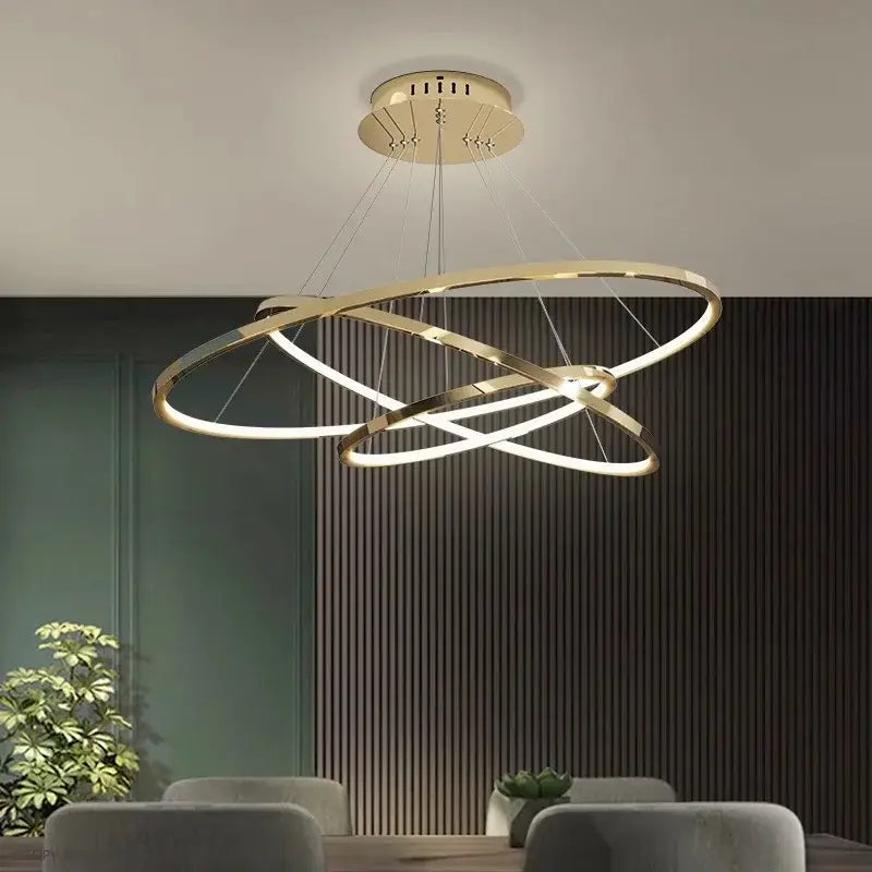 Modern gold-finished decorbites led chandelier pendant light with three interlocking circular rings for indoor use