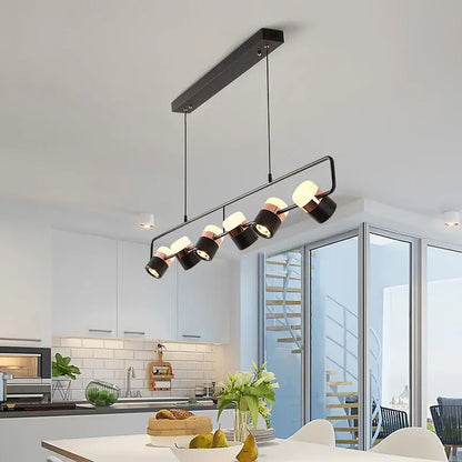 Modern black and copper DecorBites LED chandelier pendant lamp with five adjustable spotlight bulbs for dining room use