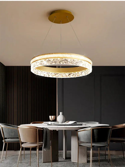 Gold-toned decorbites led chandelier pendant light with textured crystal outer ring and illuminated inner band for home decor