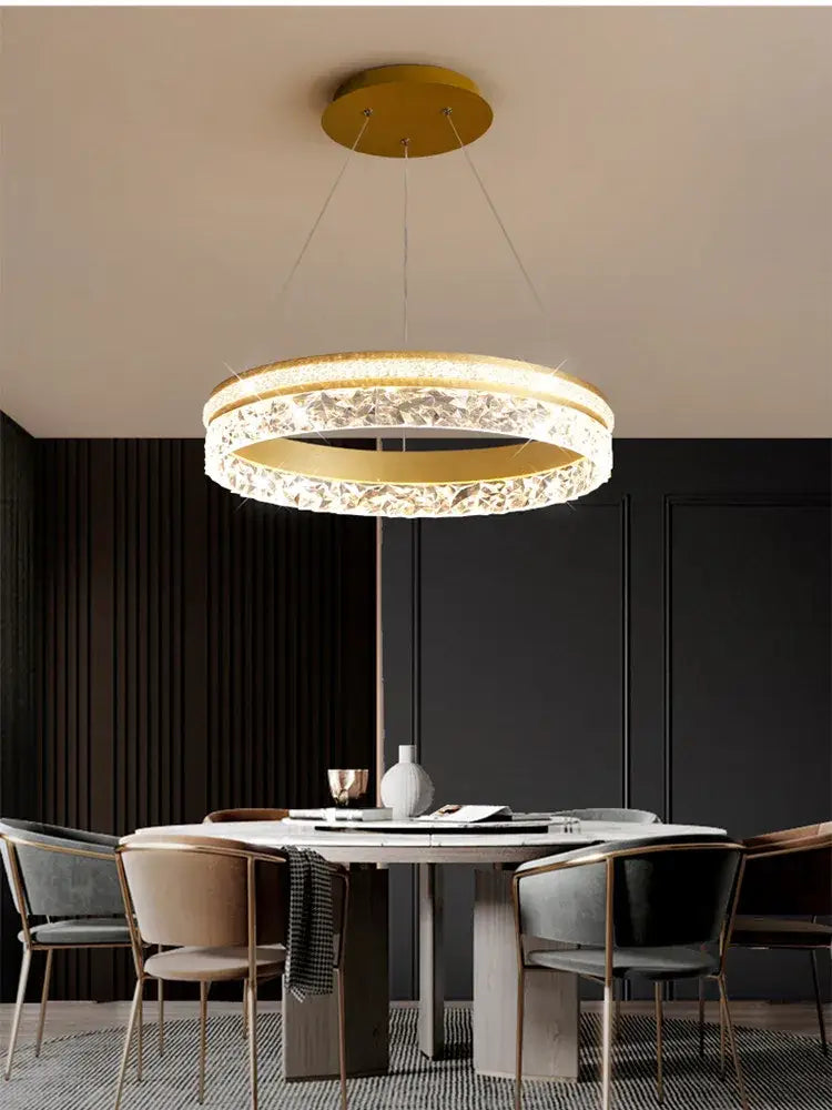 Gold-toned decorbites led chandelier pendant light with textured crystal outer ring and illuminated inner band for home decor
