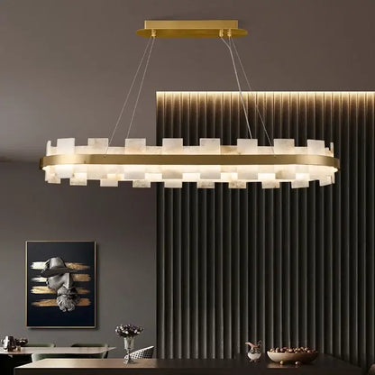 Gold-toned decorbites led chandelier with translucent off-white glass panels for bedroom and living room decor
