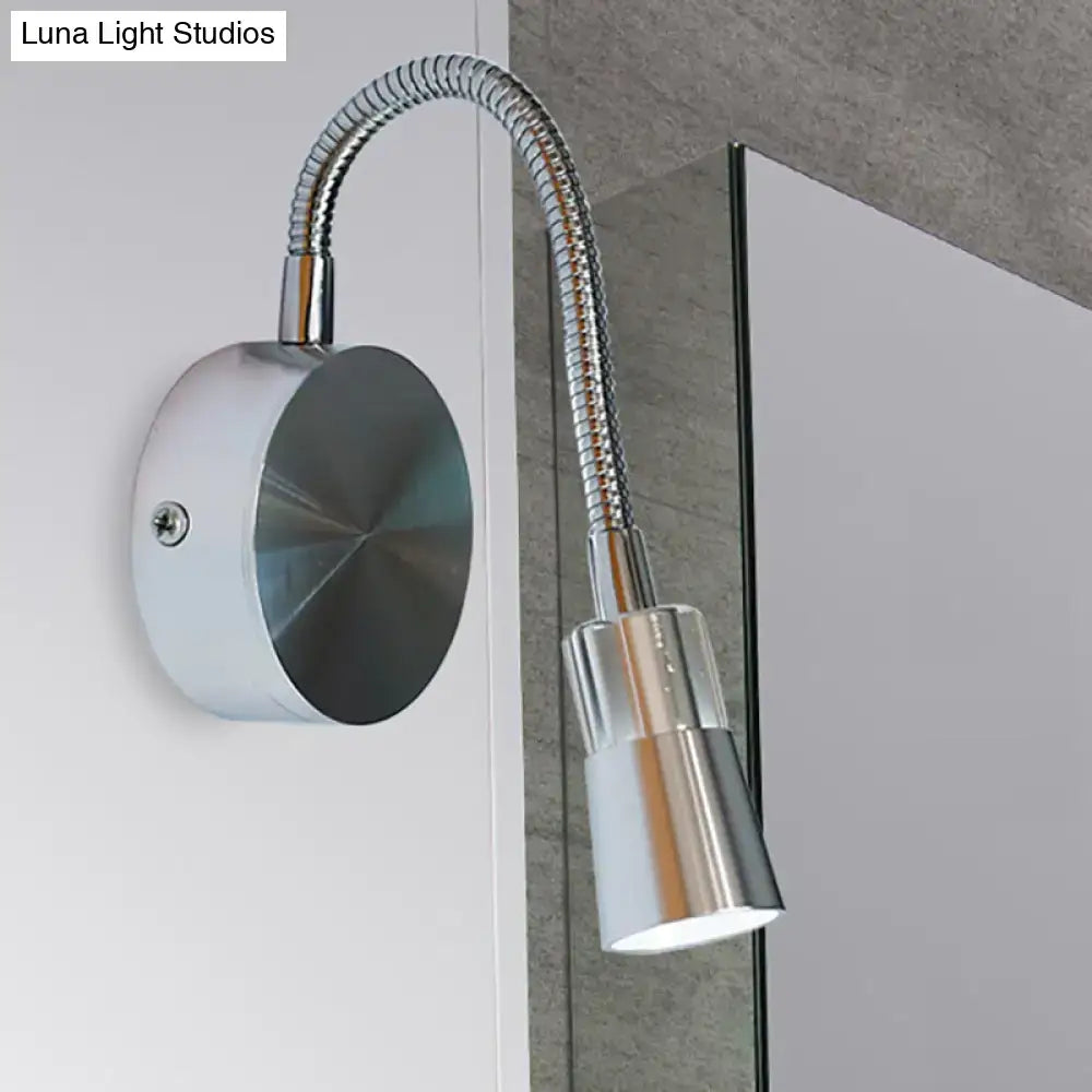 Chrome flexible gooseneck reading light with sleek mini metal shade and frosted glass for bedroom use