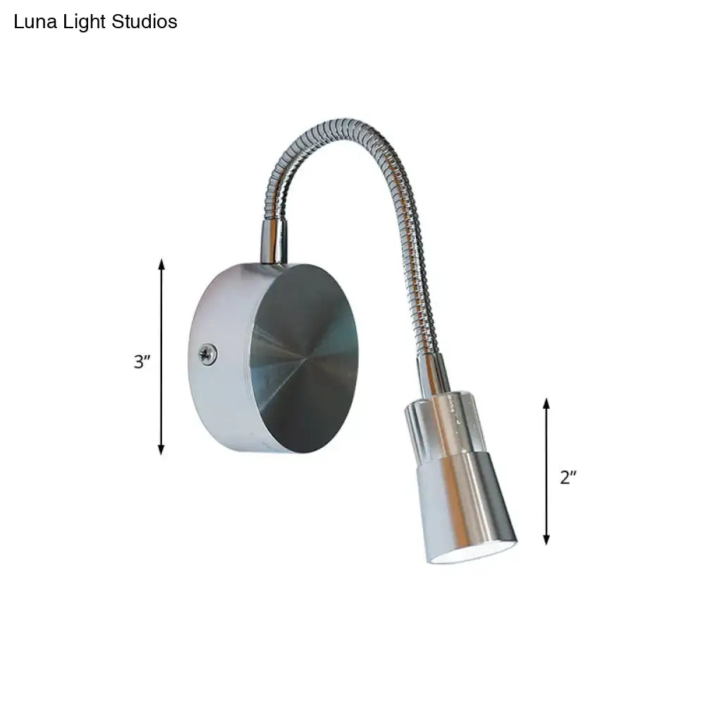 Chrome flexible gooseneck reading light with sleek mini metal shade and adjustable wall mount for bedroom use