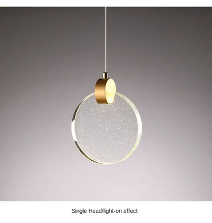 DecorBites™ led crystal pendant light with gold metal fixture and clear glass disc with sparkling particles for bedroom and bathroom