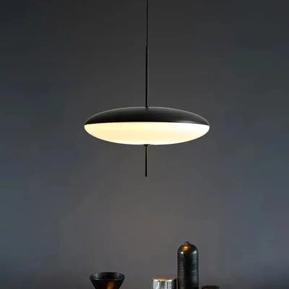 Modern black decorbites led flying saucer pendant lights with sleek disc design and warm diffused glow for dining room