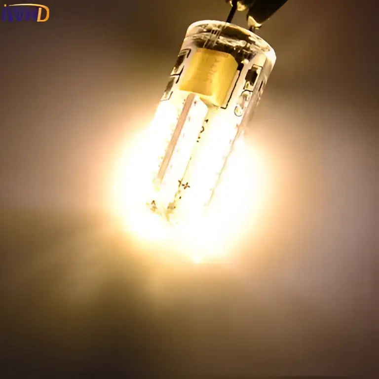 Warm white decorbites led g4 bulb with clear glass casing and visible filament designed for bi-pin chandeliers replacement