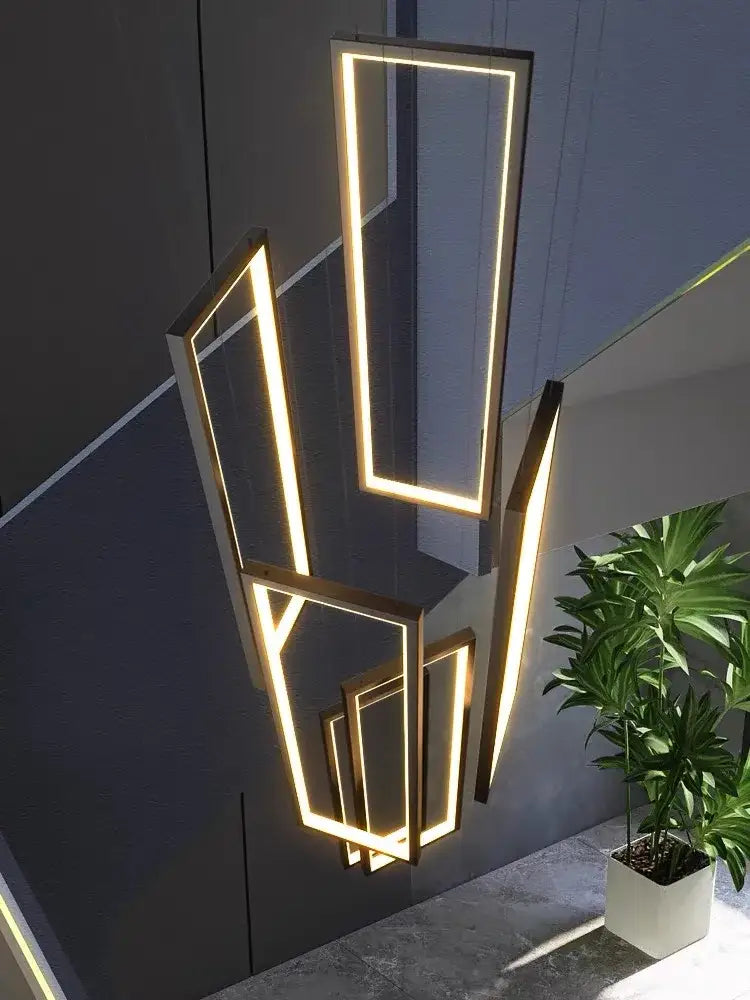 Modern geometric chandelier with illuminated golden rectangular frames by decorbites led geometry stair chandelier