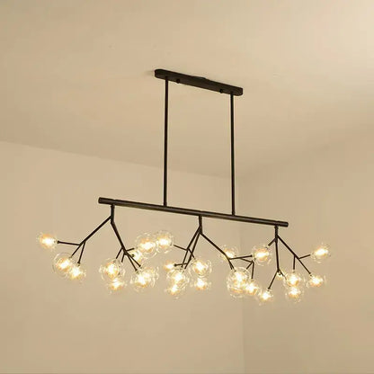 Black metal DecorBites LED glass ball branch chandelier with multiple clear globes in modern firefly design