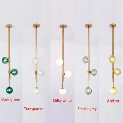 Modern brass pendant light featuring multicolored glass ball globes by DecorBites LED glass for stylish home decor