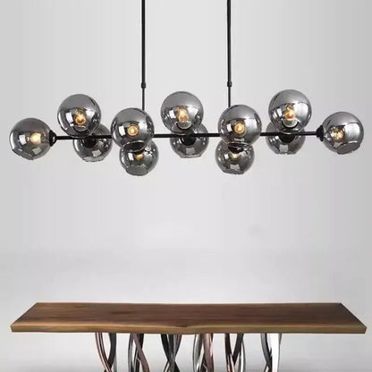 Modern chrome-finished decorbites led glass pendant light with black metal arms and hanging cords for dining and kitchen decor