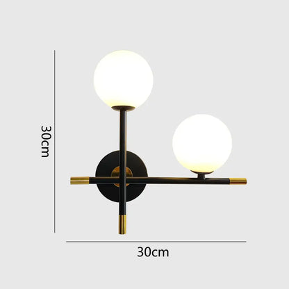 Modern black and brass decorbites led glass wall lamp with two glowing led glass ball shades for bedroom lighting