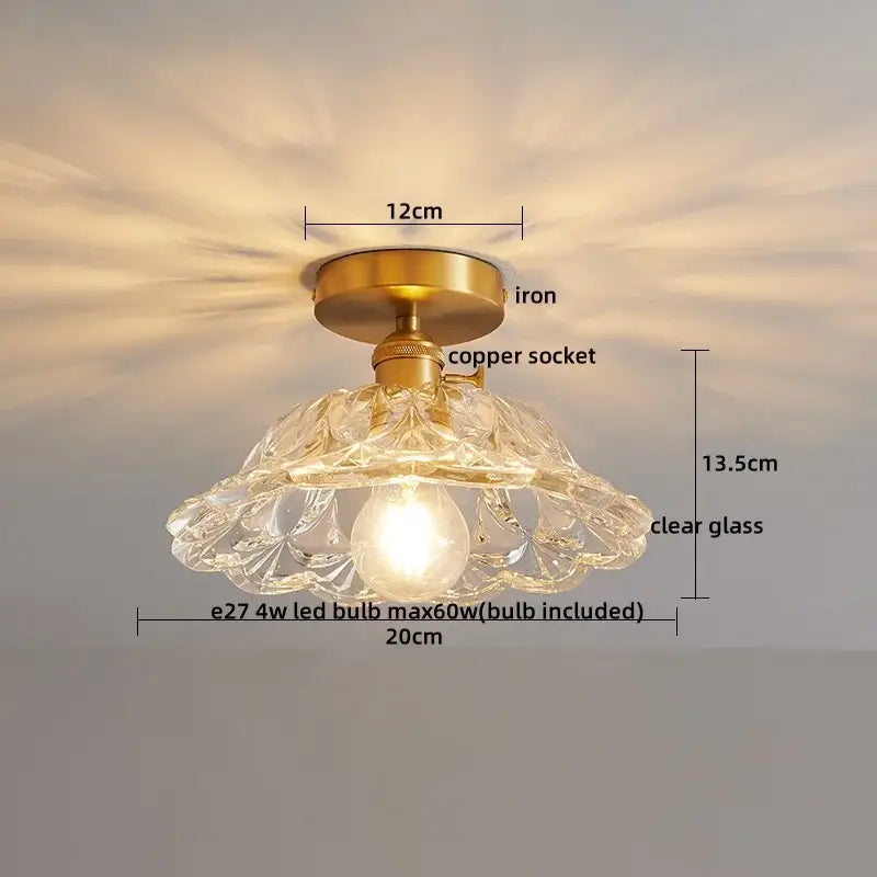 A delicate clear glass decorbites led glass ceiling lamp with brass iron base and copper socket for interior decor