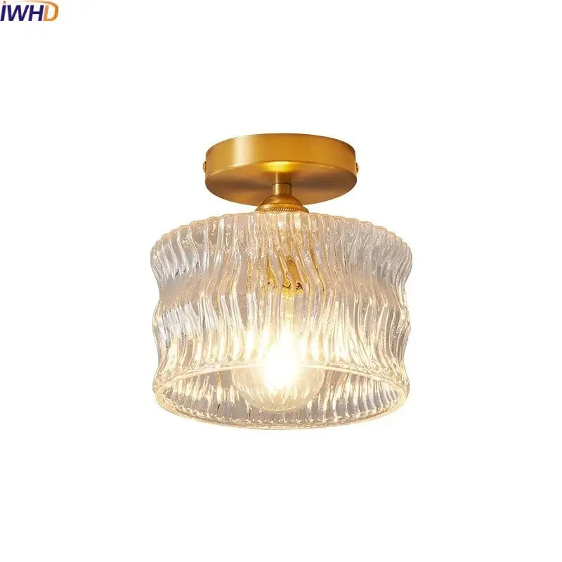 Gold-toned decorbites led glass ceiling lamp with clear ribbed glass shade for elegant interior decor lighting