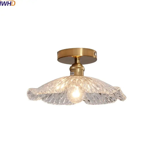 DecorBites™ LED glass ceiling lamp with brass-finished metal base and ornate textured clear glass ceiling shade