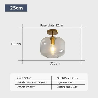 Amber-colored DecorBites™ LED glass ceiling light with frosted globe and brass-finished wrought iron base for modern spaces