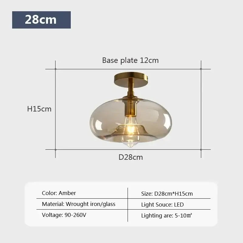 Amber-colored decorbites led glass ceiling light with frosted glass globe and brass-finished wrought iron base for modern use