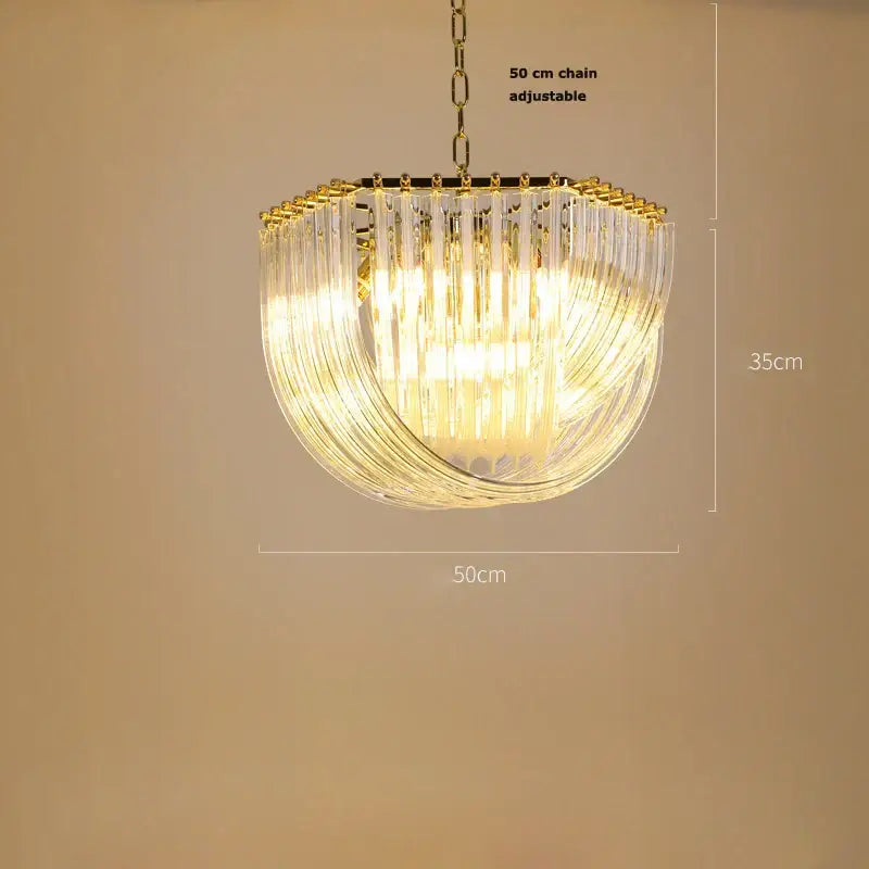 A decorbites led glass chandelier with golden frame cascading clear glass rods and adjustable chain for foyer use
