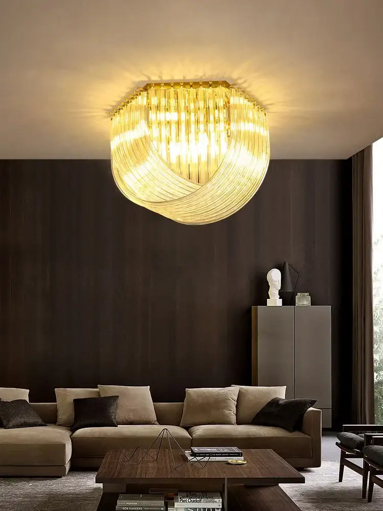 DecorBites LED glass chandelier with golden cascading crystal strands and warm glow for modern foyer lighting