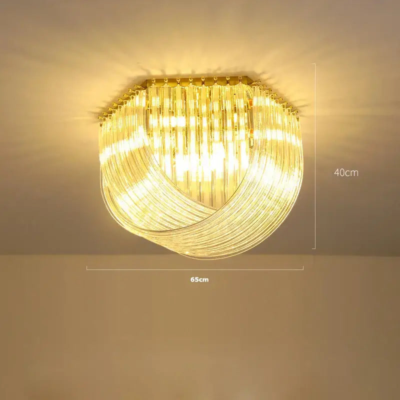 Decorbites led glass chandelier with golden frame and clear glass rods emitting warm glow for foyer lighting