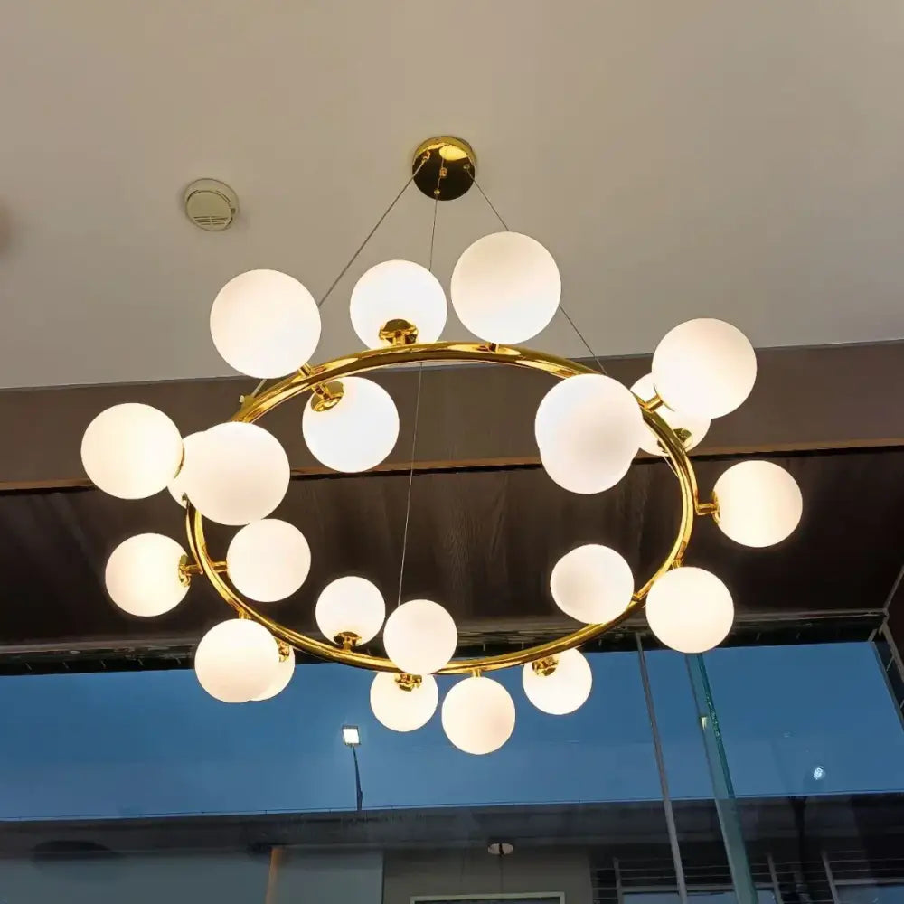 Gold-toned decorbites led glass chandelier pendant lamp with frosted glass globe bulbs for living room lighting