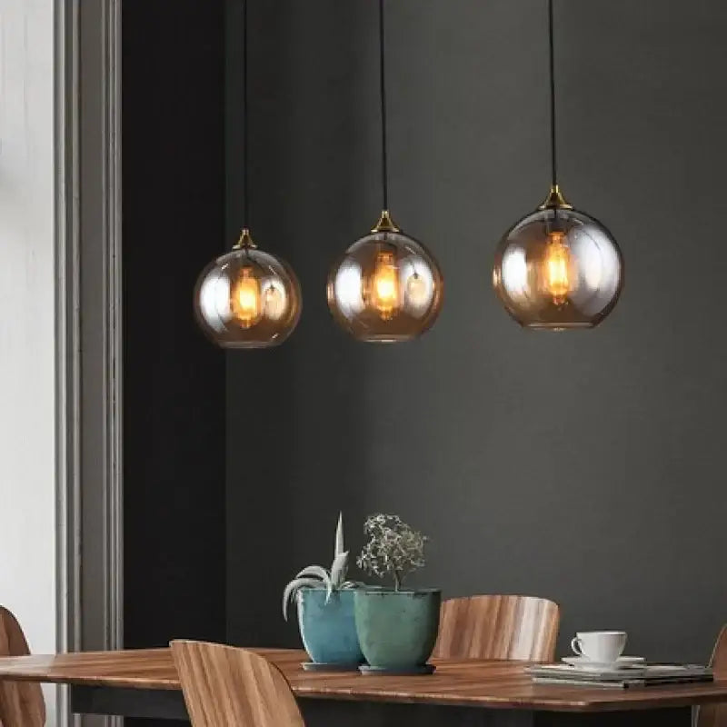 Three hanging spherical led glass pendant lights with brass accents from decorbites led glass pendant chandelier