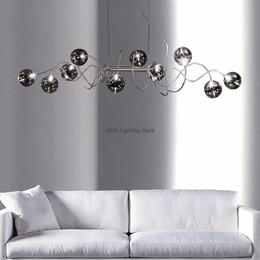 Modern chrome-finished decorbites led glass pendant chandelier with reflective spherical bulbs for living room and dining use