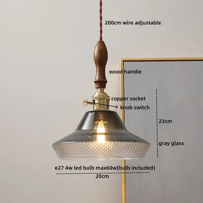 DecorBites™ led glass pendant light with textured gray glass shade, wooden handle, and copper socket for modern dining room
