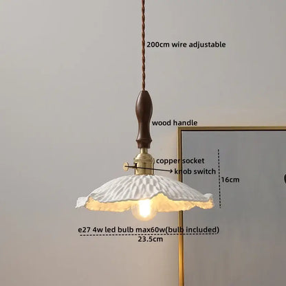 White fluted ceramic pendant light with dark wood handle and brass accents by DecorBites LED glass pendant for modern spaces