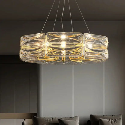 Clear glass decorbites led glass pendant light with gold-toned metal accents and modern geometric design for kitchen island